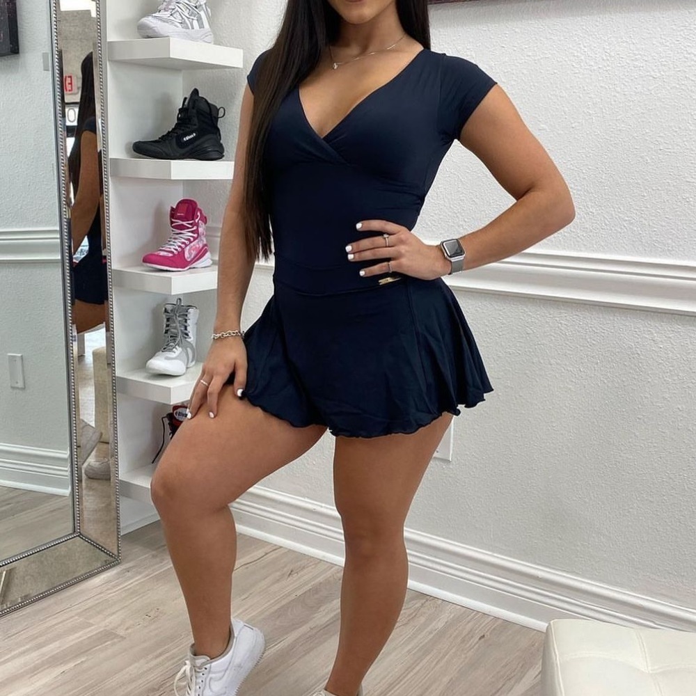 Black spots wear skirt.